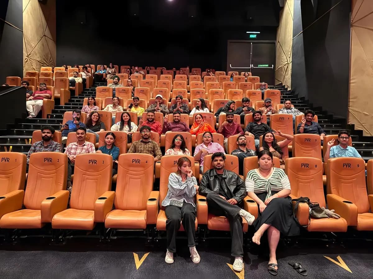 Atravelq team enjoying a movie outing together