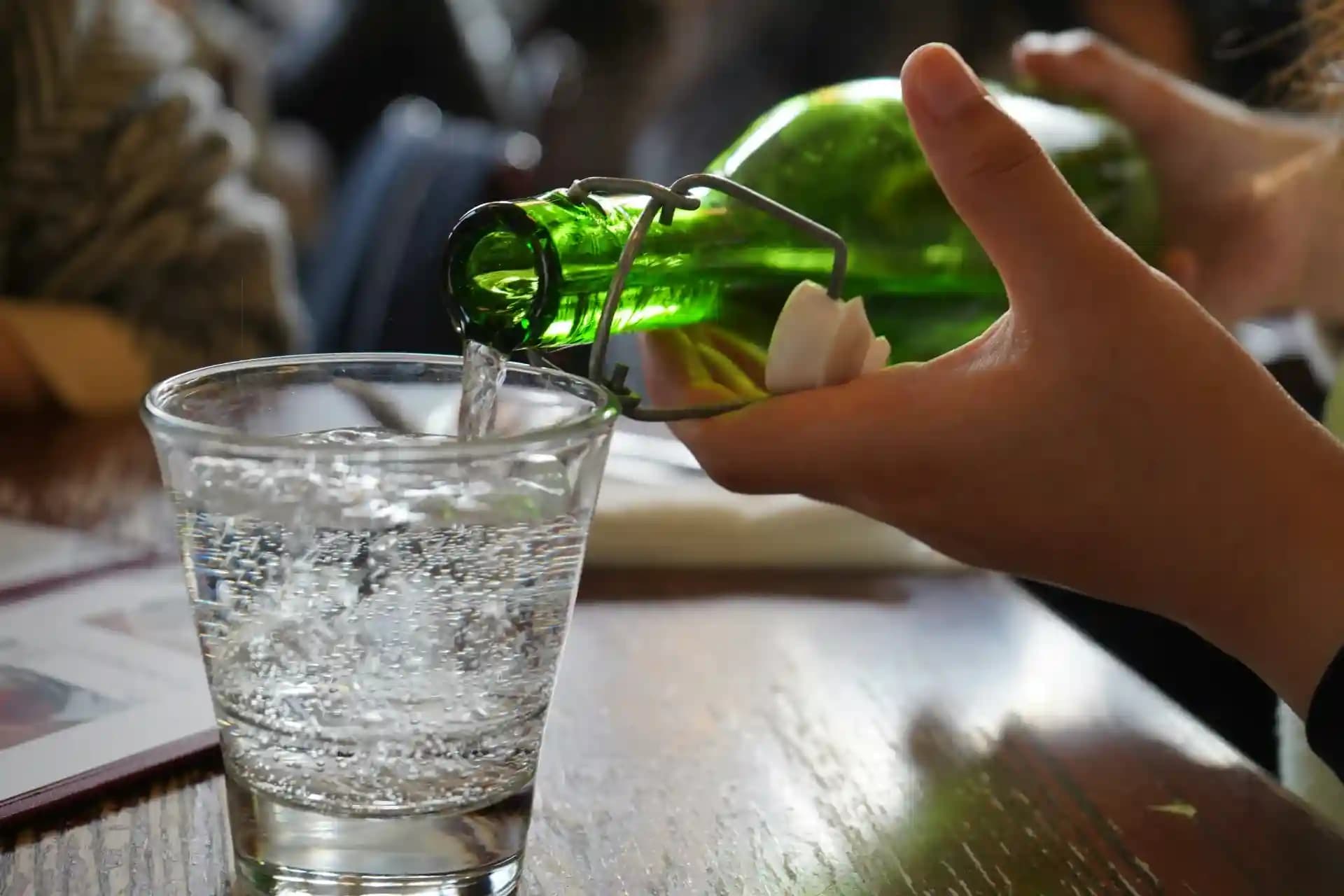 In the Korean culture the correct way to pour your drink.