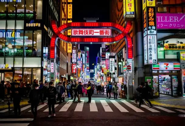 Shinjuku streets in Tokyo at night, well-lit and safe for solo travellers